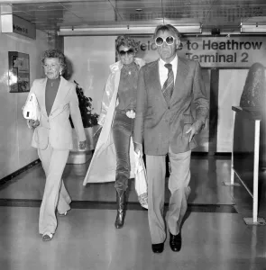 Richard Burton and his wife Susie leaving Heathrow for their home in Geneva