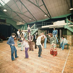 Denim Prints: Richard Gere as Danny Zuko (left) seen here in rehearsal with the rest of the cast of