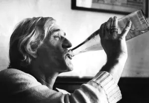 Richard Harris drinking from bottle of water during interview - 22 July 1982