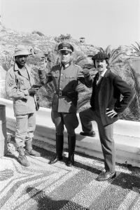 On Set Prints: Richard Roundtree, Roger Moore and Sonny Bono on the set of Escape to Athena