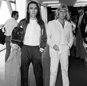 Status Quo Prints: Rick Parfitt (right) and Francis Rossi (left) of the Status Quo pop group arriving
