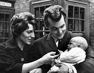 Parents Prints: Ricky Valance (David Royston Spencer) with wife Evelyn and baby