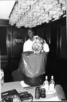 Riddick Bowe Boxer The Undisputed World Heavyweight Championship Puts His WBC Belt Into