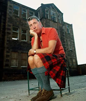 Rikki Fulton sitting outside old school September 1981 A&copy;mirrorpix