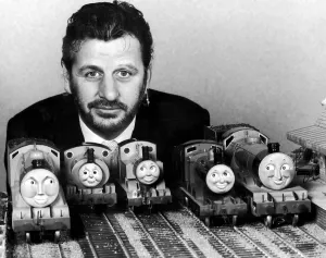 Toys Prints: Ring Starr of the Beatles pictured here with Thomas the Tank Engine Toys