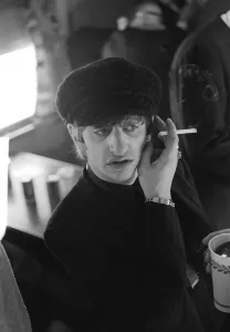 Ringo Starr of the Beatles pop group, pictured smoking a cigarette after the band leaft