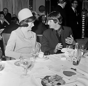 Ringo Starr chats with smiling stage star Maggie Smith during the Variety Club Luncheon
