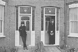 Ringo Starr and John Lennon outside their fictional address in Ailsa Avenue, Twickenham