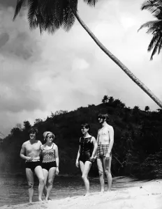 Ringo Starr and John Lennon with their wives in Tobago in January 1966 Cynthia