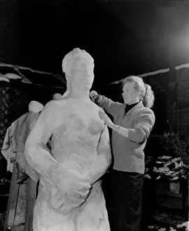 Sculpture Prints: Rita Ling Sculptress Carves snowman 31 / 3 / 1952 C1621 / 1