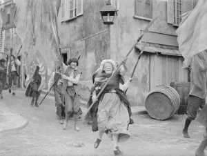 Anger Prints: Rita Tobin (centre) seen here as a a film extra re enacting the storming of the Bastille