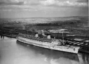 Clouds Prints: RMS Queen Elizabeth seen here lying againt berth 101 in Greenock at the John Brown