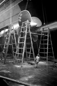 The RMS Queen Mary is in dry dock at Southampton undergoing refitting
