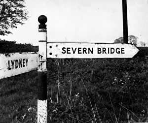 Road Sign Prints: A road sign points the way to the recently completed Severn Bridge - 23rd April 1967