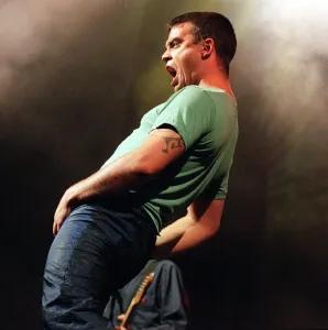 Robbie Williams in concert at slane castle August 1999 Gyrating to the fans
