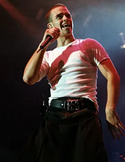 Robbie Williams performing on stage during the the first night concert of Take That