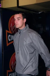 Robbie Williams Singer August 98 Arriving for the premiere of Lock Stock And Two
