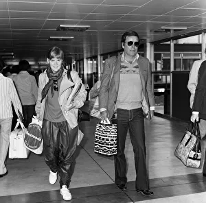 00964 Prints: Robert Wagner and his 18-year-old daughter Katie at London Airport to fly to Los Angeles