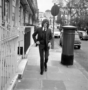 Railings Prints: Robin Gibb of the Bee Gees pop group walking down a London street. 29th April 1969