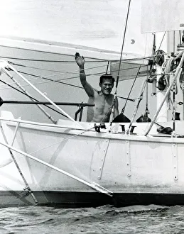 00093 Prints: Robin Knox Johnston waves to his parents from his Suhaili boat at Falmouth before his