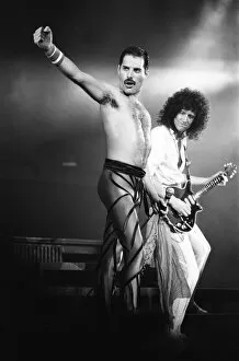 00277 Collection: Rock group Queen in concert at Wembley Arena. Lead singer Freddie Mercury