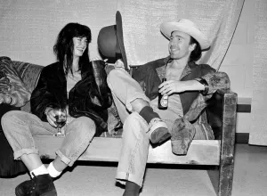 Rock group U2 in concert in USA - May 1987 The Edge enjoying a beer