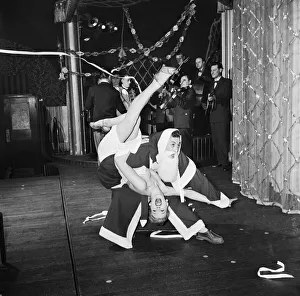 Rock n roll Santa (Roger Palmer) holds the floor with Pamela Bevan at London