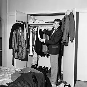 Rock and roll singer Vince Eager shows off his fabulous wardrobe. 5th April 1959