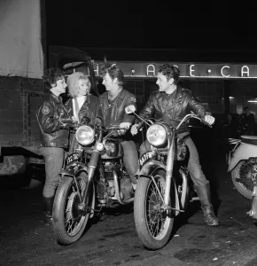 Rocker boys on motorcycles - called sickles'- talking to girls