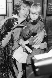 Disabled Prints: Rod Hull and Emu with Maelea Forrester aged 6 who lost her sight aged 4