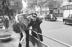 00350 Prints: Rod Hull and emu seen here attacking a traffic warden outside the Shaftsbury Theatre