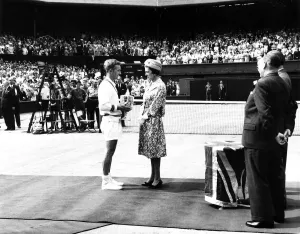 00099 Prints: Rod Laver receives the mens trophy from HRH princess Marina July 1961