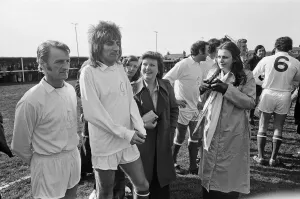 Rod Stewart 2nd from left (in white) playing football in his football team The Goal