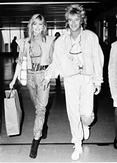 Rod Stewart Rock Singer Songwriter at Heathrow with his girlfriend Kelly Emberg