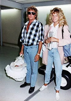 Rod Stewart and Wife Rachel leaves Heathrow Airport Aug 1992