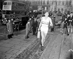 Vest Prints: Roger Bannister arrives at St Martins in the Field with a red dispatch box. December 1952