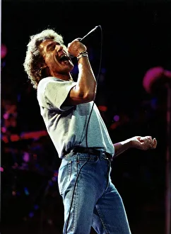 Roger Daltrey Singer from the rock group The Who singing on stage July 1989