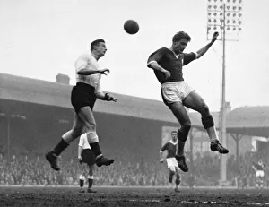 Roger Hunt beaten to the ball by Jackson of Lincoln City during the match at Anfield