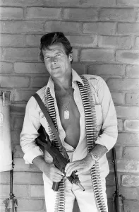 Core54 Prints: Roger Moore actor, filming The Wild Geese in South Africa. October 1977