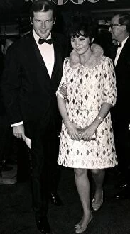 01415 Collection: ROGER MOORE AND LISA MOORE AT THE PREMIERE OF CUSTER OF THE WEST