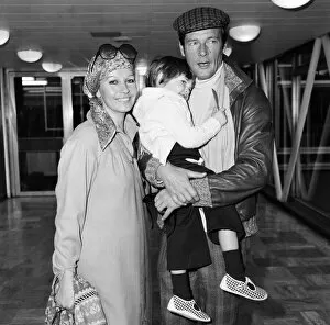 Images Dated 1st March 1977: Roger Moore, off to Los Angeles from Heathrow Airport, is planning to a make a comedy