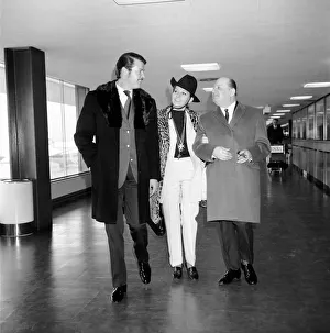 Roger Moore and his wife Luisa left Heathrow Airport with Sir Lew Grade for the Monte