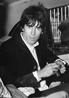 THE ROLLING STONES ARCHIVE Keith Richards sitting in rear of taxi cab - July 1967