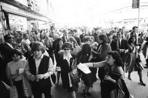 00299 Prints: The Rolling Stones on Broadway. Brian Jones and Bill Wyman signing autographs