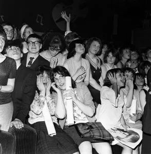 Girls Prints: The Rolling Stones. Fans scream as the Stones perform on stage at the Imperial Ballroom