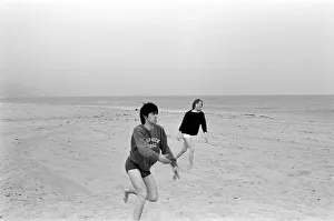 The Rolling Stones. Keith Richards and Brian Jones seen here posing on Malibu beach