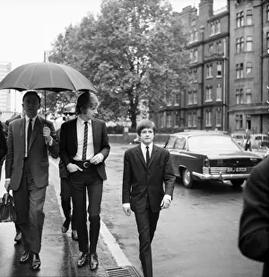 Rolling Stones: manager Andrew Loog Oldham and his chauffeur Reg Stiles (sunglasses