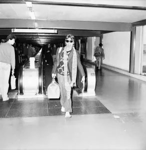 Rolling Stones. Mick Jagger leaving London Airport Heathrow for a Christmas Holiday in