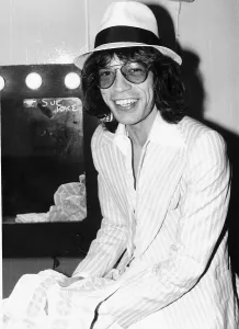 00165 Prints: Rolling Stones: Mick Jagger relaxing in his dressing room before a concert May 1976
