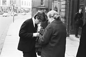 Rolling Stones; Mick Jagger signs an autograph outside the court at Tattenhall